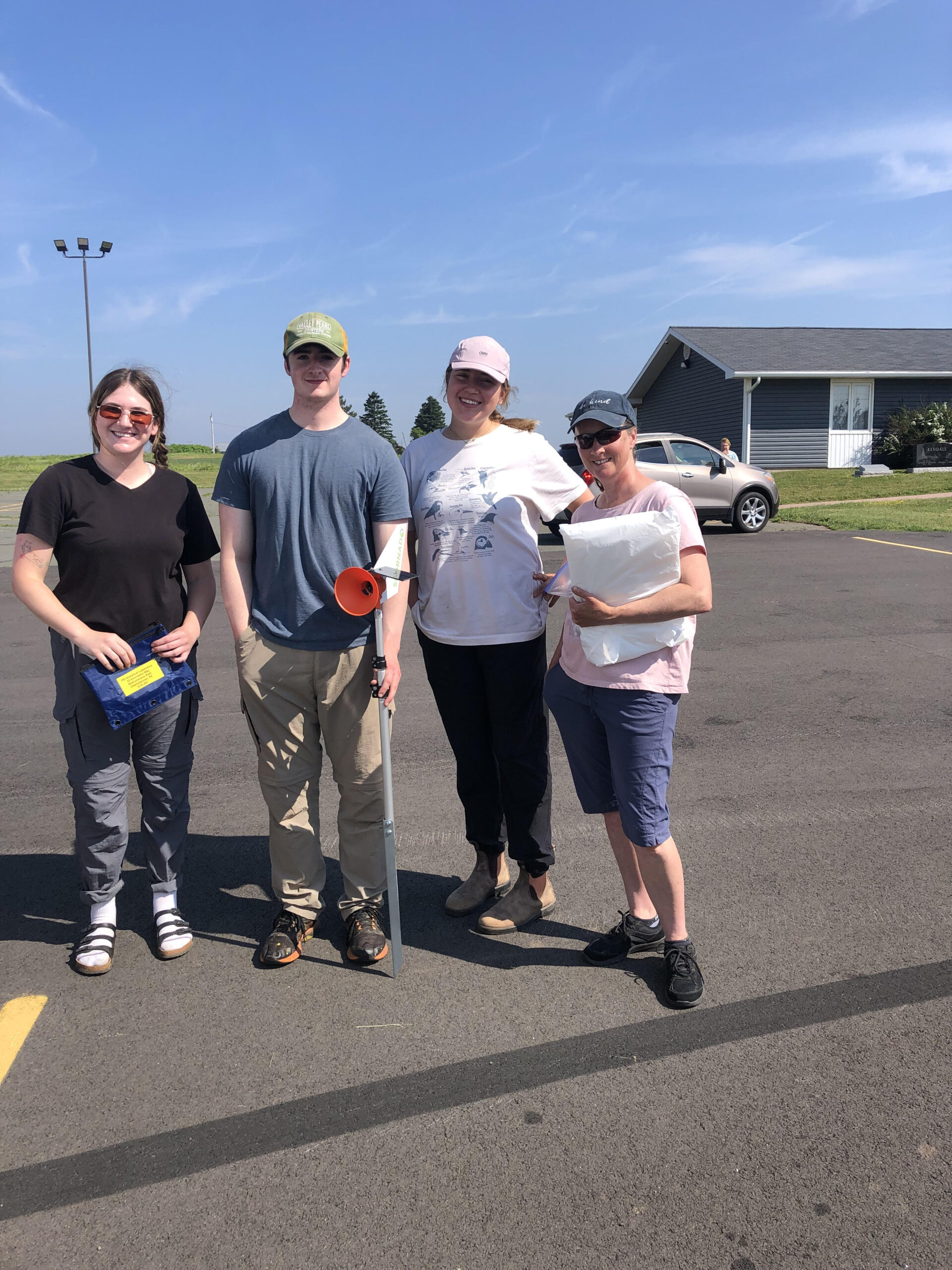 The Richmond Bay Watershed Association is one of several watershed groups assisting with spore trap collection. Here Richmond Bay Watershed association coordinator, Cathy Gallant and her field crew get ready for the first spore trap collection.